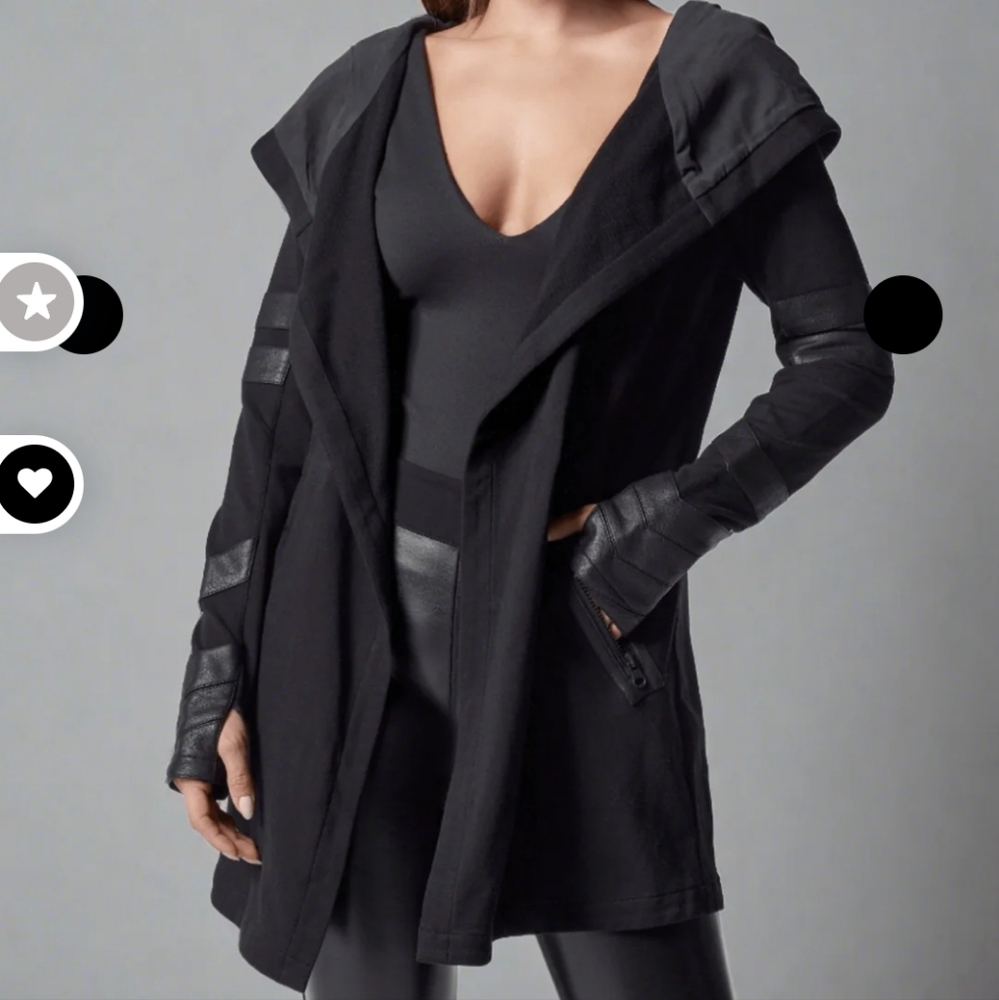 Blanc Noir travel coat.  Leather detailing, and satin hood.